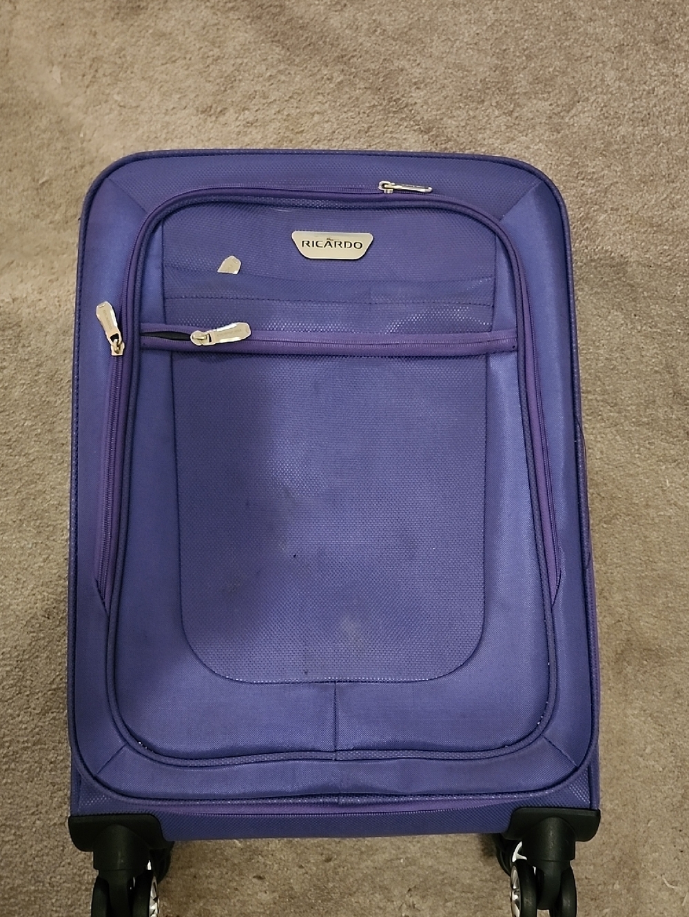 Purple Carry-On Spinner Bag